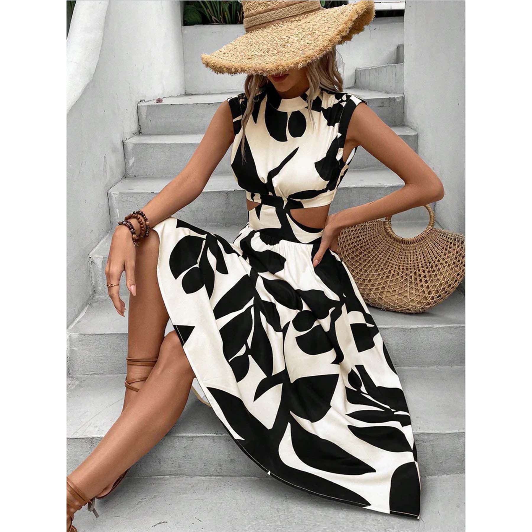 Sommerkjole med Bladmotiv og Cut-Out Design | Chic og Feminin
